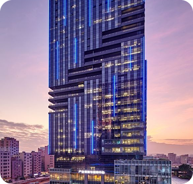 Modern casino hotel building at night